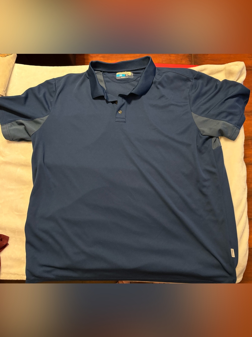 Magellan Outdoors Navy and Blue performance polo shirt